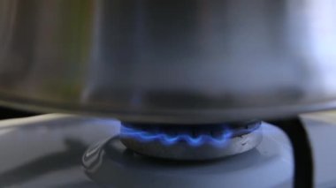 Gas burner. The kettle is placed on the gas stove. 