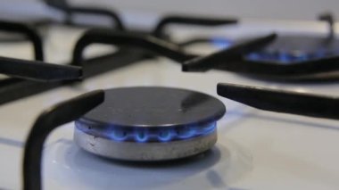 Gas burner. The kettle is placed on the gas stove. 