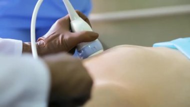Ultrasound examination of the fetus of a pregnant woman. Ultrasonic scanner. Apparatus for ultrasound examination.