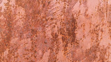 Paslı kırmızı metal yüzey. Pas pasla boyanmış kırmızı yüzey.