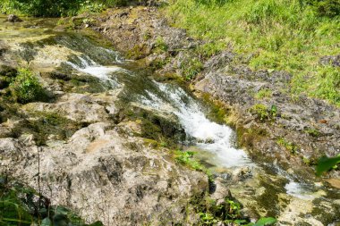 Tatra Mountains. View of the mountain river, waterfall in the mountains.