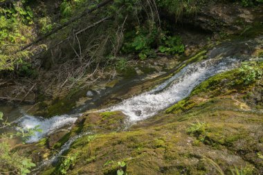 Tatra Mountains. View of the mountain river, waterfall in the mountains.