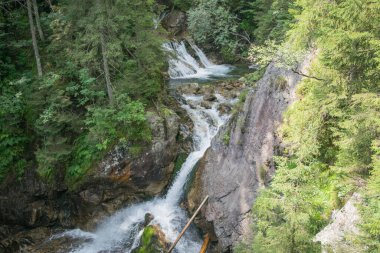 Tatra Mountains. View of the mountain river, waterfall in the mountains.
