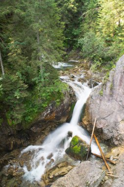 Tatra Mountains. View of the mountain river, waterfall in the mountains.