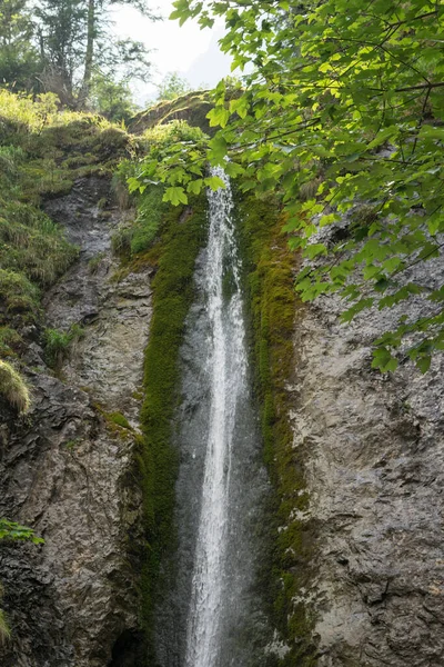 Tatra Mountains. View of the mountain river, waterfall in the mountains.
