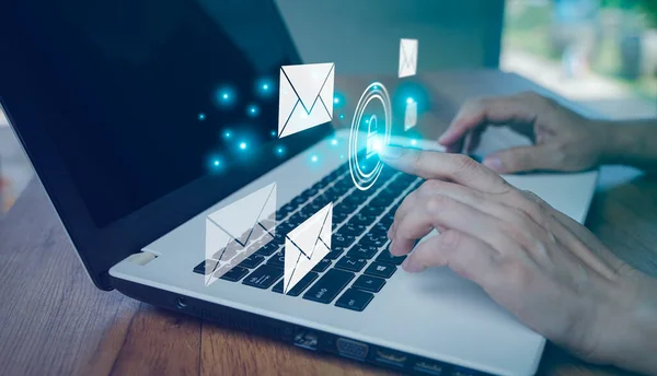 Close up finger touch to lock or encrypt the email on laptop. Concept email marketing communication network, message online, digital mail technology. Connection using e-mail. Send electronic letter.
