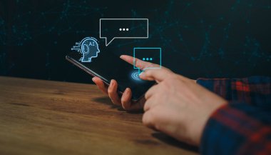 Women hand using smartphone typing Live chat chatting and social network concepts, chatting conversation working at home in chat box icons pop up. Social media marketing technology concept.