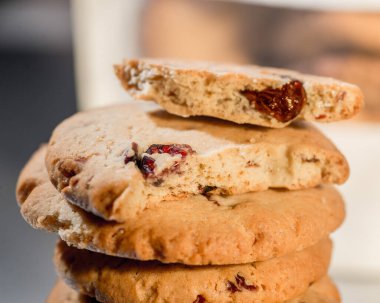 Cookies with berries. Baking Very close on a pink background.