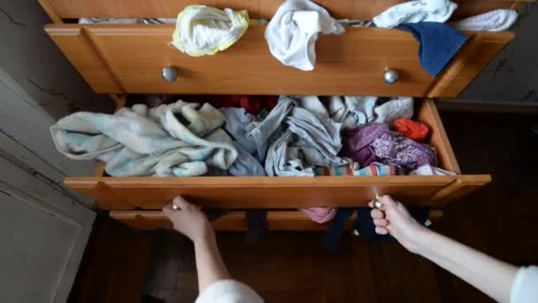 Mess Clothes Closet Person Inaccurately Stuffs Clothes Linen Closet — 图库视频影像