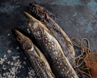 Salted dried pike. Fish appetizer for beer. Stockfish