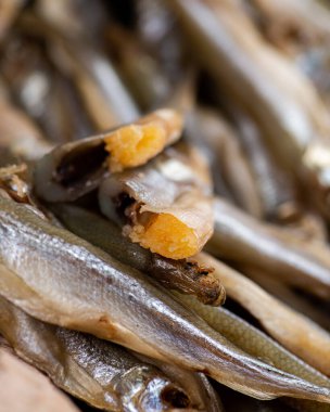 Salted dried capelin. Fish appetizer for beer. Stockfish