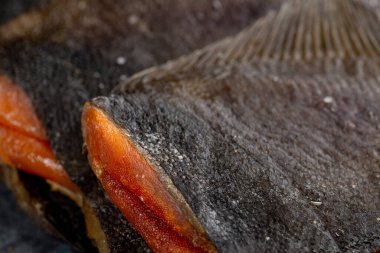 Salted dried flounder. Stockfish. Fish appetizer for beer