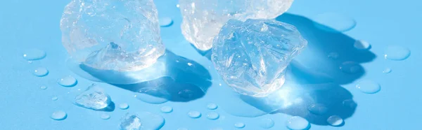 Close Crushed Melting Ice Sunlight Blue Background Summer Refreshment Concept — Stock Photo, Image