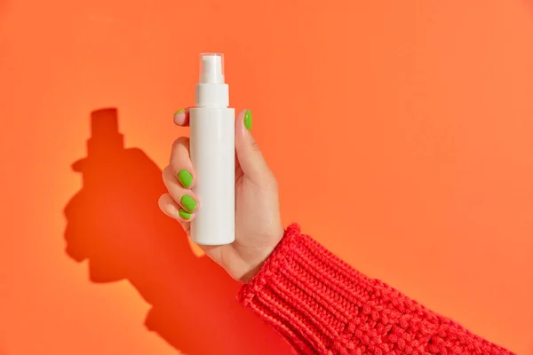 Womans Hand Holding Cream Container Orange Background Self Care Beauty — Stock Photo, Image