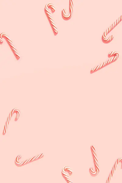 圣诞贺卡 带有糖果手杖 粉红的背景 有复制的空间 平面放置顶部视图 图库照片