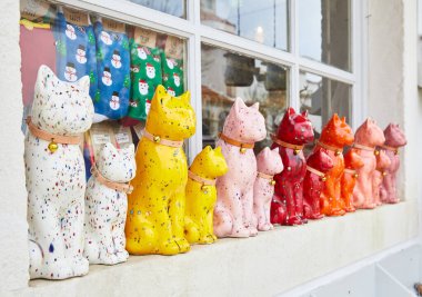 Ceramics for sale on the street market in Nazare. Authentic traditional portuguese souvenirs. Travel concept