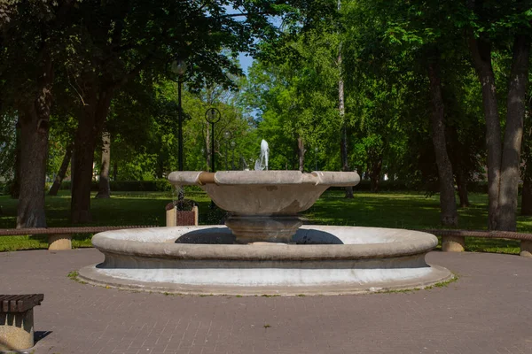 stock image Old fountain in the centre park of a small town Kohtla-Jrve on a sunny summer day.
