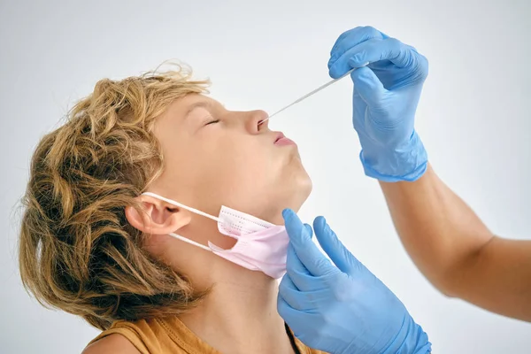 Medic Swab Taking Coronavirus Test Nose Child Closed Eyes Clinic — Stock Photo, Image