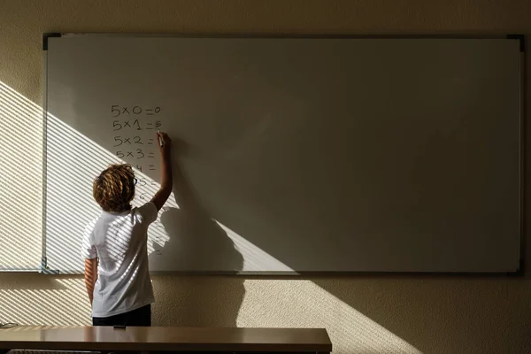 Back View Anonymous Schoolboy Writing Multiplication Table Whiteboard Classroom Math — Stock Photo, Image