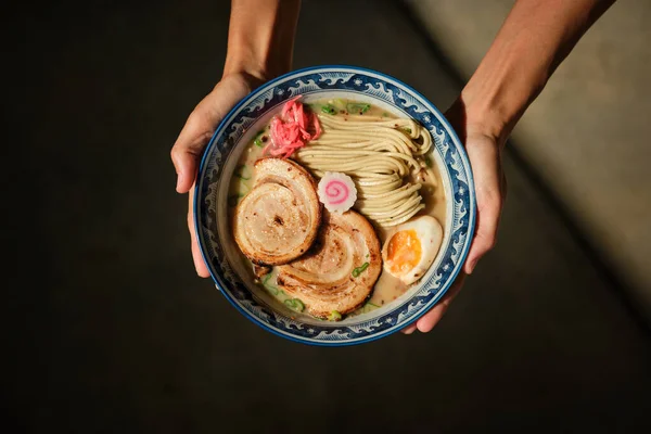 Top View Anonymous Woman Showing Bowl Delicious Ramen Garnished Pork — Stock Photo, Image