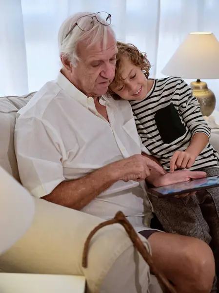 Focused Grandfather Casual Wear Surfing Modern Tablet Boy While Sitting — Stock Photo, Image