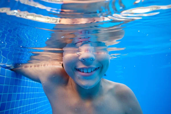 Crop Boy Swimming Clear Blue Transparent Water Pool Smiling Happily — Stock Photo, Image