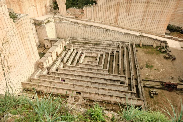 stock image From above of great sculpture with sandstone quarries overgrown by trees and vegetation with labyrinths