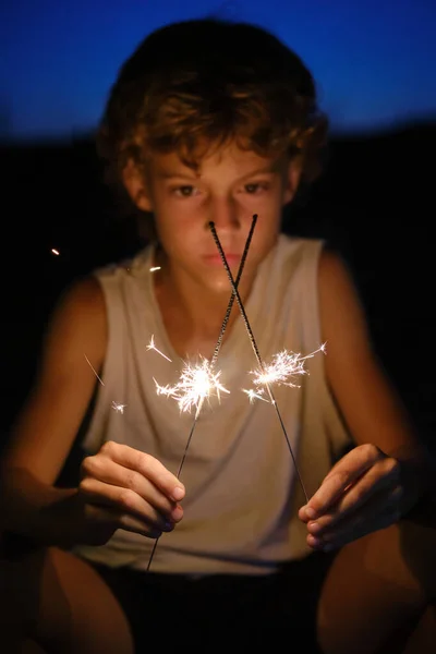 Curious Preteen Boy Watching Sparkles Burning Bengal Lights Dark Sky — Stock Photo, Image