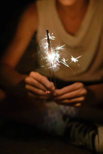 Unrecognizable Crop Person Holding Glowing Sparklers Night Celebration Festive Event — Stock Photo, Image