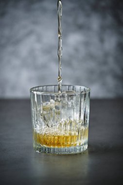 Whisky Cocktail in glass, close up