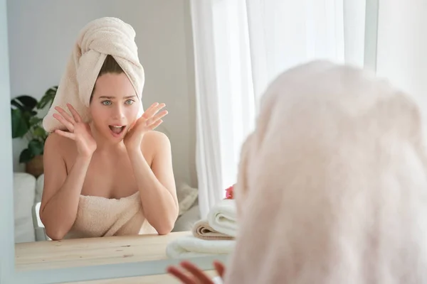 Astonished Female Wrapped Towels Looking Reflection Mirror Opened Mouth Table — Stock Photo, Image