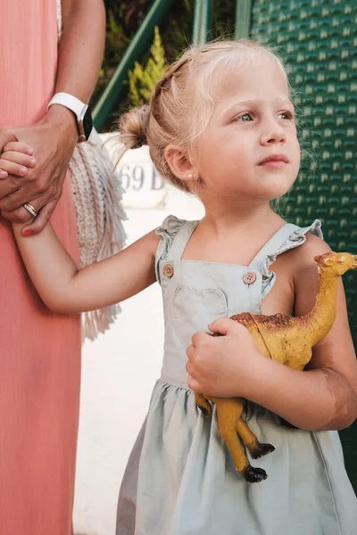 Pensive Preschool Girl Braids Dress Standing Crop Mother Holding Hands — Stock Photo, Image