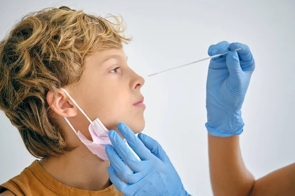Crop Anonymous Medic Disposable Gloves Swab Taking Covid Test Kid — Stock Photo, Image