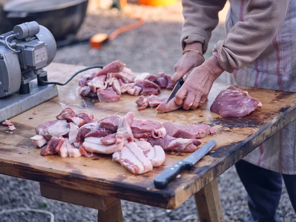 Unrecognizable Person Slicing Raw Meat Sharp Knife Wooden Table While — Stock Photo, Image