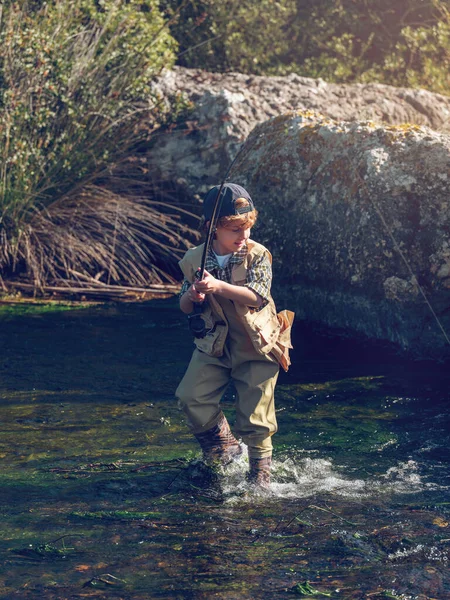 Full Body Focused Boy Fishing Rod Trying Pull Fish Out — Stock Photo, Image