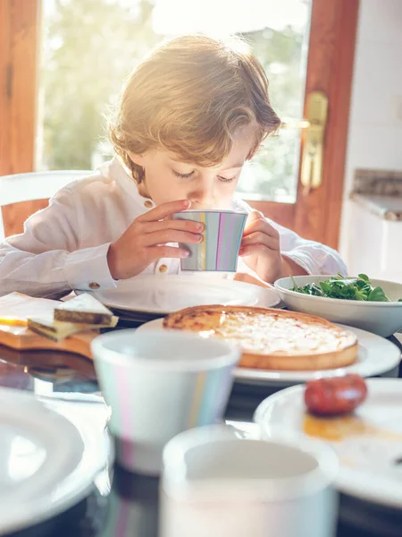 Adorable Boy Curly Hair Having Breakfast While Sitting Table Delicious — Stock Photo, Image