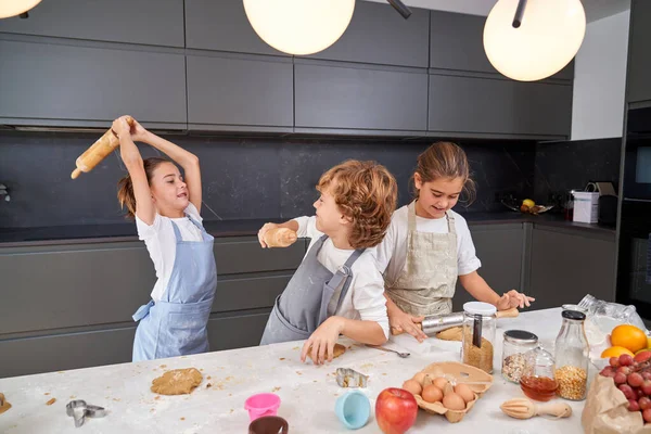 Cheerful Siblings Aprons Bonding Having Fun While Kneading Dough Rolling — Stock Photo, Image
