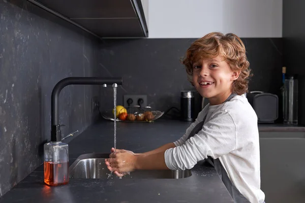 Joyful Boy Looking Camera Smile While Washing Hands Pouring Water — Stock Photo, Image
