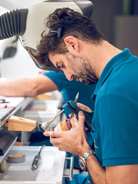 Side View Bearded Male Orthodontist Technician Using Tool While Carving — Stock Photo, Image