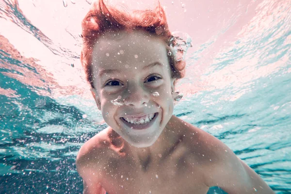 Underwater Portrait Smiling Kid Naked Torso Swimming Clear Water Surrounded — Stock Photo, Image