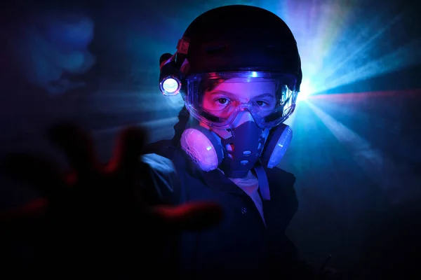 Serious Boy Protective Gas Mask Looking Camera Outstretched Arm While — Stock Photo, Image