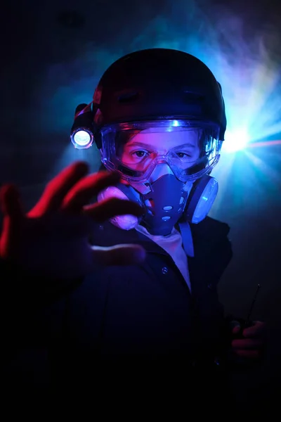 Kid Protective Gas Mask Flashlight Looking Camera Outstretched Arm While — Stock Photo, Image