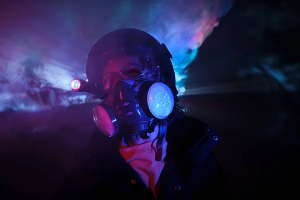Thug Protective Respirator Exhaust Filters Bright Glowing Flashlight Standing Dark — Stock Photo, Image