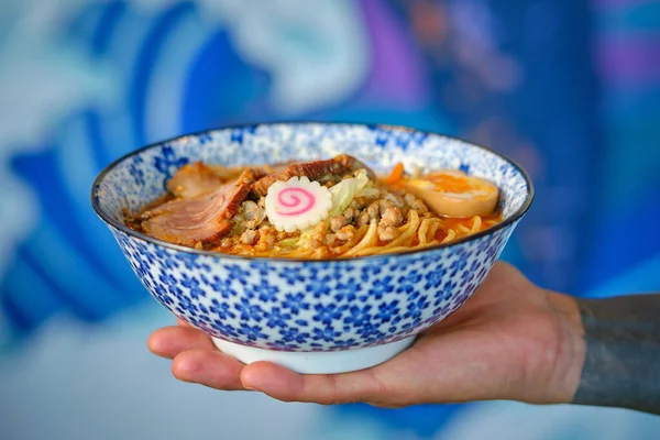 Crop Unrecognizable Chef Demonstrating Bowl Appetizing Ramen Soup Noodles Char — Stock Photo, Image