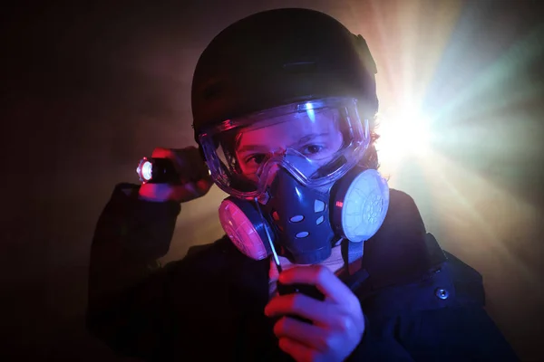 Serious Kid Protective Respirator Walkie Talkie Shining Flashlight Looking Camera — Stock Photo, Image