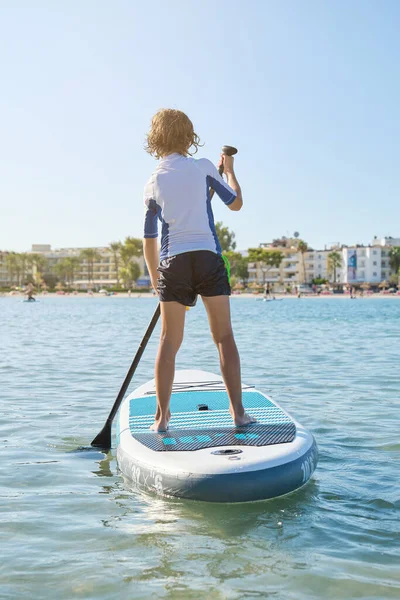 Full Body Back View Faceless Boy Activewear Standing Paddleboard Rowing — Φωτογραφία Αρχείου