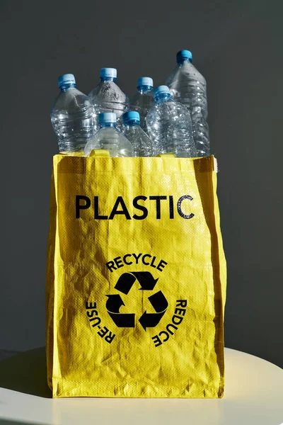 Bag Inscription Recycle Sign Full Empty Plastic Bottles Reuse Table — Stock Photo, Image