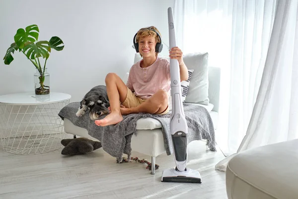 Positive Boy Vacuum Cleaner Smiling Looking Camera While Sitting Comfortable — Stock Photo, Image