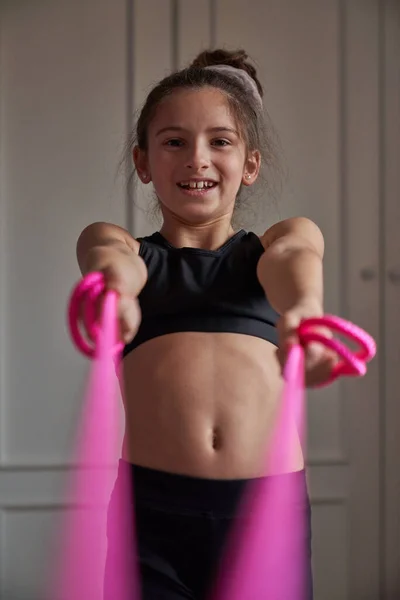 Smiling Preteen Gymnast Black Sportswear Hair Bun Exercising Pink Skipping — Stock Photo, Image