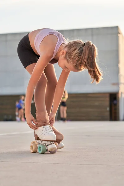 Full Body Side View Active Girl Pulling Leggings Quad Roller — Stock Photo, Image